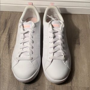 White Adidas with pink accent